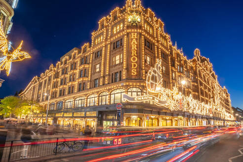 View of Harrods department store illuminated at dusk, Knightsbridge, London, England, United Kingdom, Europe - RHPLF25517