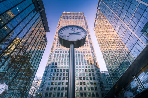 View of Canary Wharf tall buildings at sunset, Docklands, London, England, United Kingdom, Europe - RHPLF25520