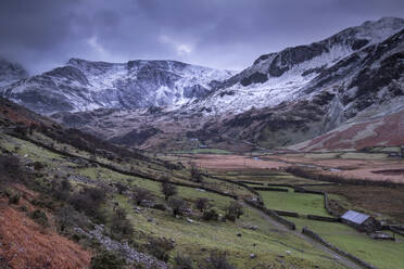 The Nant Ffrancon Valley backed by the Glyderau mountains in winter, Snowdonia National Park, Eryri, North Wales, United Kingdom, Europe - RHPLF25531