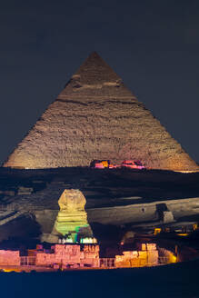 The Great Sphinx of Giza and The Pyramid of Khafre illuminated, UNESCO World Heritage Site, Giza, Egypt, North Africa, Africa - RHPLF25608