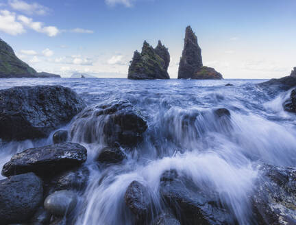 Long exposure of the ocean and the sea stacks in the Bahia da Alagoa, Flores island, Azores islands, Portugal, Atlantic Ocean, Europe - RHPLF25658