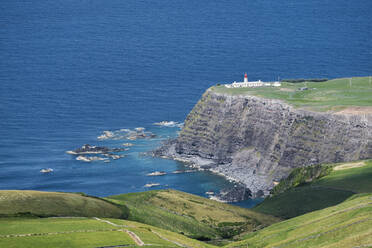 Farol de Albarnaz from top of a cliff, Flores island, Azores islands, Portugal, Atlantic Ocean, Europe - RHPLF25667