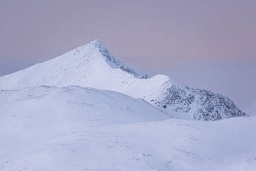 Skredfloget mountain peak at dusk in winter, Senja, Troms og Finnmark county, Norway, Scandinavia, Europe - RHPLF25682