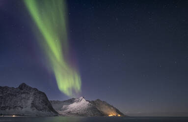The Aurora Borealis (Northern Lights) over Steinfjord and Skinnarmen mountain, Senja, Troms og Finnmark county, Norway, Scandinavia, Europe - RHPLF25686