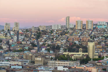 Buildings against sky in Cerro Polanco at sunset, Valparaiso, Valparaiso Province, Valparaiso Region, Chile, South America - RHPLF25710