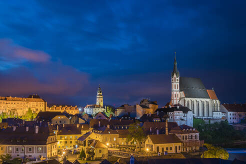 View of historic center of Cesky Krumlov dominated by St. Vitus Church at twilight, UNESCO World Heritage Site, Cesky Krumlov, South Bohemian Region, Czech Republic (Czechia), Europe - RHPLF25863