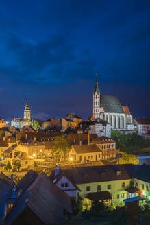 View of historic center of Cesky Krumlov dominated by St. Vitus Church at twilight, UNESCO World Heritage Site, Cesky Krumlov, South Bohemian Region, Czech Republic (Czechia), Europe - RHPLF25866