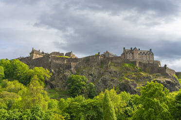 Low angle view of Edinburgh Castle perched on rocks, Edinburgh, Scotland, United Kingdom, Europe - RHPLF25965