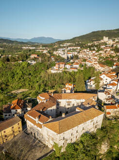 Aerial view of Pazin castle and town with Ucka mountain in the background, Central Istria, Croatia. - AAEF18374