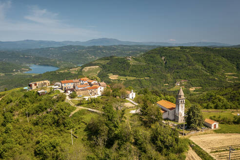 Aerial view of Zamask village with Butonega lake, located in central Istria, Croatia. - AAEF18378