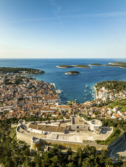 Aerial view of Hvar old town and fortress in Dalmatia, Croatia. - AAEF18393