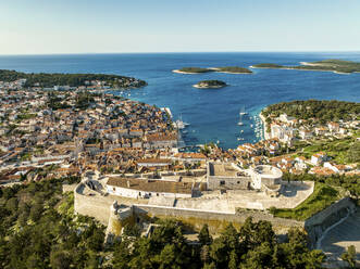 Aerial view of Hvar old town and fortress in Dalmatia, Croatia. - AAEF18394