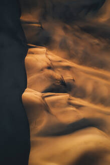 Aerial view of huge orange curvy dunes in desert, Dune 7, Walvis Bay, Namibia. - AAEF18404