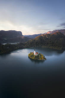Aerial View of Church of the Assumption at Lake Bled at sunrise, Slovenia. - AAEF18415