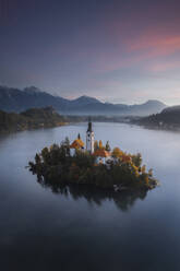Aerial View of Church of the Assumption at Lake Bled at sunrise, Slovenia. - AAEF18417