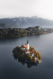 Aerial View of Church of the Assumption at Lake Bled at sunrise, Slovenia. - AAEF18418