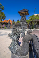 View of sculpture and Hindu Temple near Shelter Kebencanaan on Kuta Beach, Kuta, Bali, Indonesia, South East Asia, Asia - RHPLF26025