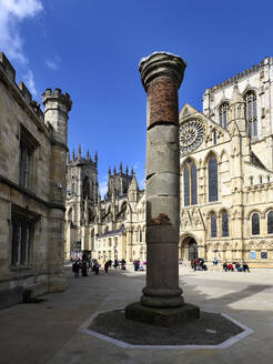 Roman Column and York Minster in Minster Yard, York, Yorkshire, England, Unted Kingdom, Europe - RHPLF26046