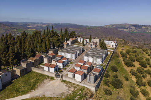 Aerial view of Pietragalla cemetery on hilltop, Potenza, Basilicata, Italy. - AAEF18466