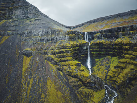 Aerial view of Krosslaug hot spring waterfall, Westfjords, Iceland. - AAEF18594