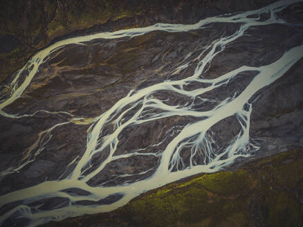Aerial view of abstract water pattern from a river estuary, Southern Region, Iceland. - AAEF18607