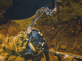 Aerial view of a Viking village along the lake in Austurland, Iceland. - AAEF18629