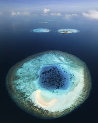 Aerial view of scattered islands on the Indian Ocean at Maldives Archipelagos. - AAEF18667