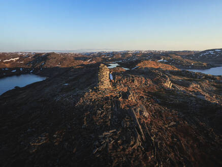 Aerial view of person in Skarsvag trail end, Nordkapp, Finnmark, Norway. - AAEF18682