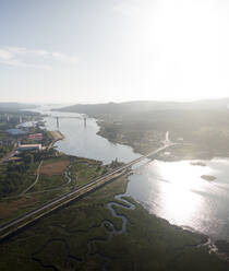 Aerial view of Vikings towers, Torres de Oeste and natural marshes by Ulla river in Catoira, Pontevedra, Galicia, Spain. - AAEF18705