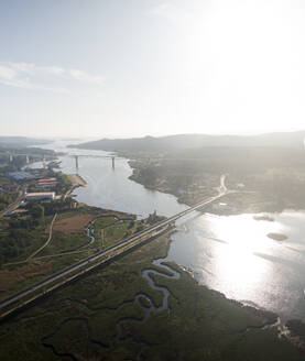 Aerial view of Vikings towers, Torres de Oeste and natural marshes by Ulla river in Catoira, Pontevedra, Galicia, Spain. - AAEF18705