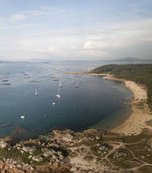 Aerial view of Punta Cabalo lighthouse and Area da Secada beach in Illa de Arousa, Ria de Arousa, Pontevedra, Galicia, Spain. - AAEF18714