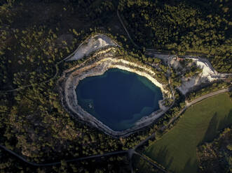 Aerial view of Cartelle quarry in Teixugueira Village, Ourense, Spain. - AAEF18725