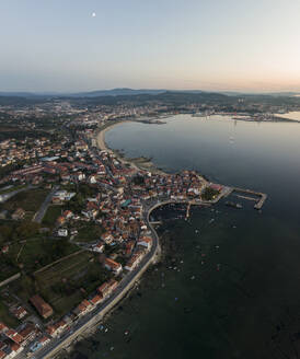 Aerial view of clam farms in Carril town and Vilagarcia de Arousa city in Ria de Arousa, Pontevedra, Galicia, Spain. - AAEF18733