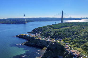 Aerial view of Yavuz Sultan Selim Bridge over the Bosphorus and Garipce village, Istanbul, Turkey. - AAEF18772