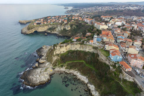 Aerial view of Black Sea seaside town of Sile and lighthouse in Istanbul, Turkey. - AAEF18785