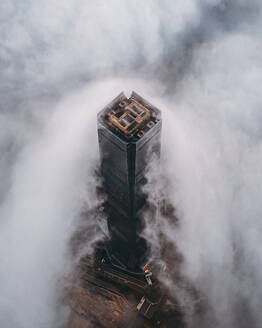 Aerial view of the International Commerce Centre (ICC) with low clouds in Hong Kong downtown, China. - AAEF18867