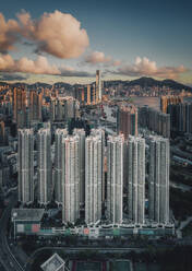 Aerial view of high density residential buildings in Hong Kong Island at sunset, Hong Kong, Kowloon district, China. - AAEF18869