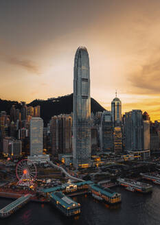 Aerial view of Hong Kong skyline along the waterfront at sunset, Kowloon district, Hong Kong, China. - AAEF18870