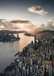 Aerial view of Hong Kong skyline at sunset along Hong Kong Island coastline, China. - AAEF18872