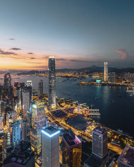 Aerial view of Hong Kong skyline and the financial district at sunset along Hong Kong Island coastline, China. - AAEF18885