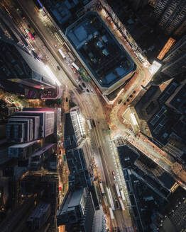 Aerial top down view of Hong Kong downtown at night, view of city light and vehicles on the road, Hong Kong island, China. - AAEF18886