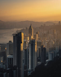 Aerial view of Hong Kong skyline and the financial district at sunrise along Hong Kong Island coastline, China. - AAEF18905