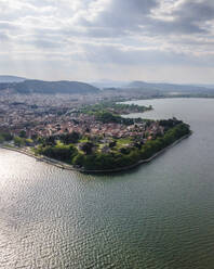 Aerial view of Ioannina old town, a small town along Lake Ioannina, Epirus, Greece. - AAEF19103