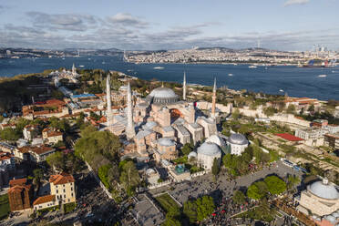 Aerial view of Hagia Sophia (Ayasofya Camii) mosque in Sultanahmet district during the Muslim celebration day in Istanbul, Turkey. - AAEF19132