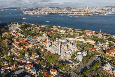 Aerial view of Hagia Sophia, a famous Byzantine mosque along the Marmara Sea and the Bosphorus in Sultanahmet district in Istanbul, Turkey. - AAEF19136