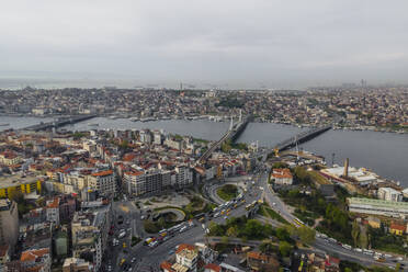Aerial view of Ataturk bridge and Galata bridge crossing the Golden Horn river estuary in Istanbul European side, Beyoglu, Turkey. - AAEF19148