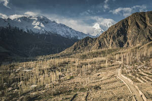 Aerial view of Mt Rakaposhi, at sunrise from Hunza valley, Gilgit Baltistan, Karakoram Range, Himalayas. - AAEF19181