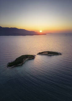 Aerial view of Ksamil Islands at sunset along the coastline in Saranda, Vlore, Albania. - AAEF19213