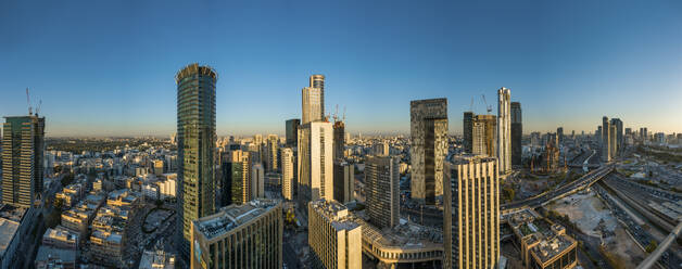 Panoramic aerial view skyscraper in financial district at sunset, Tel Aviv, centre district, Israel. - AAEF19218