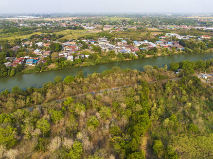 Aerial view of river Pa Sak, mixed forest and village Phra Non, Nakhon Luang, province of Ayutthaya, Thailand. - AAEF19230